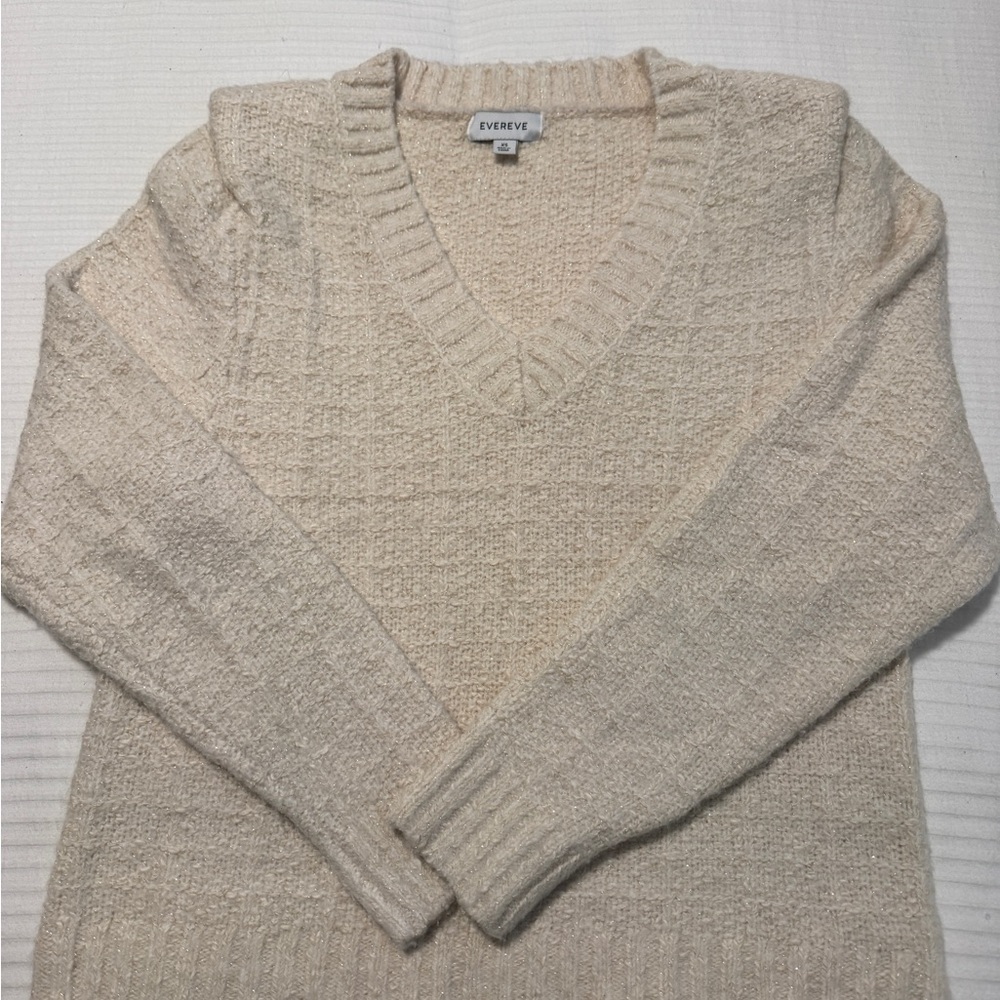 Evereve Women's Cream V-Neck Sweater with gold accents and padded shoulders